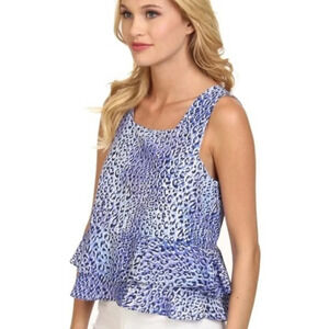 Rebecca Taylor tank size 0 flowy peplum.​​
